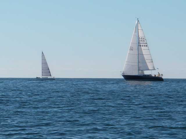 Mainstay V (SH) doing a sail change as Badger (DH) overtakes